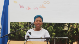 Young lady speaking at a podium