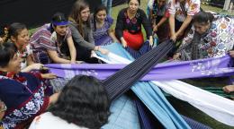 Indigenous women's group members hold several pieces of fabric in a circular shape. It's part of a performance for the opening ceremony to kick off the Generation Equality Forum in Mexico. The ceremony was held at the Complejo Cultural Los Pinos in Mexico City on 29 March 2021.
