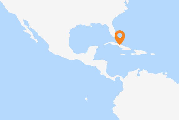 A map of South and Central America with a marker on Cuba. 