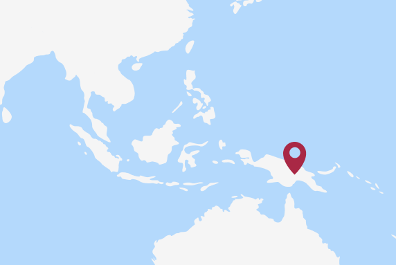 A borderless map of South America with a pin located on Papua New Guinea.