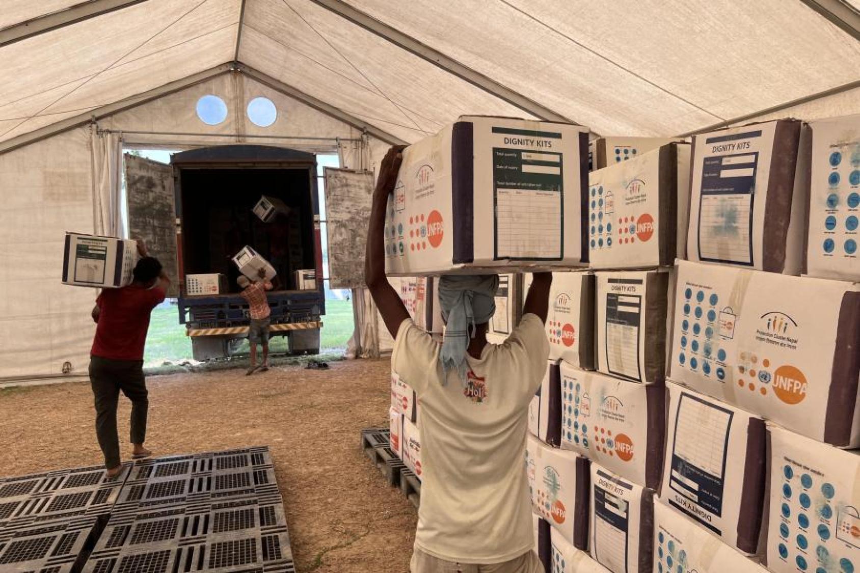 Dispatching Dignity Kits from Humanitarian Staging Area for the distribution to flood affected women and girls in Bardiya and Kailali