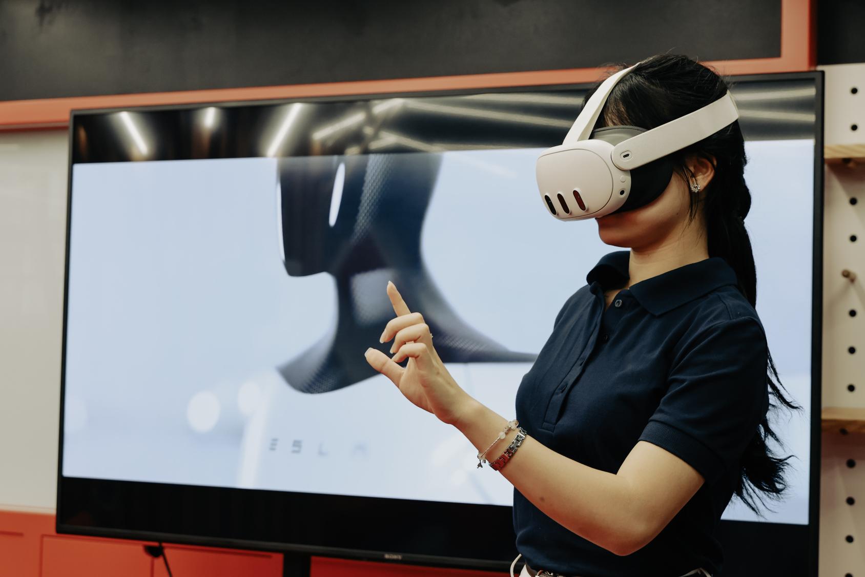 A young lady using a VR headset