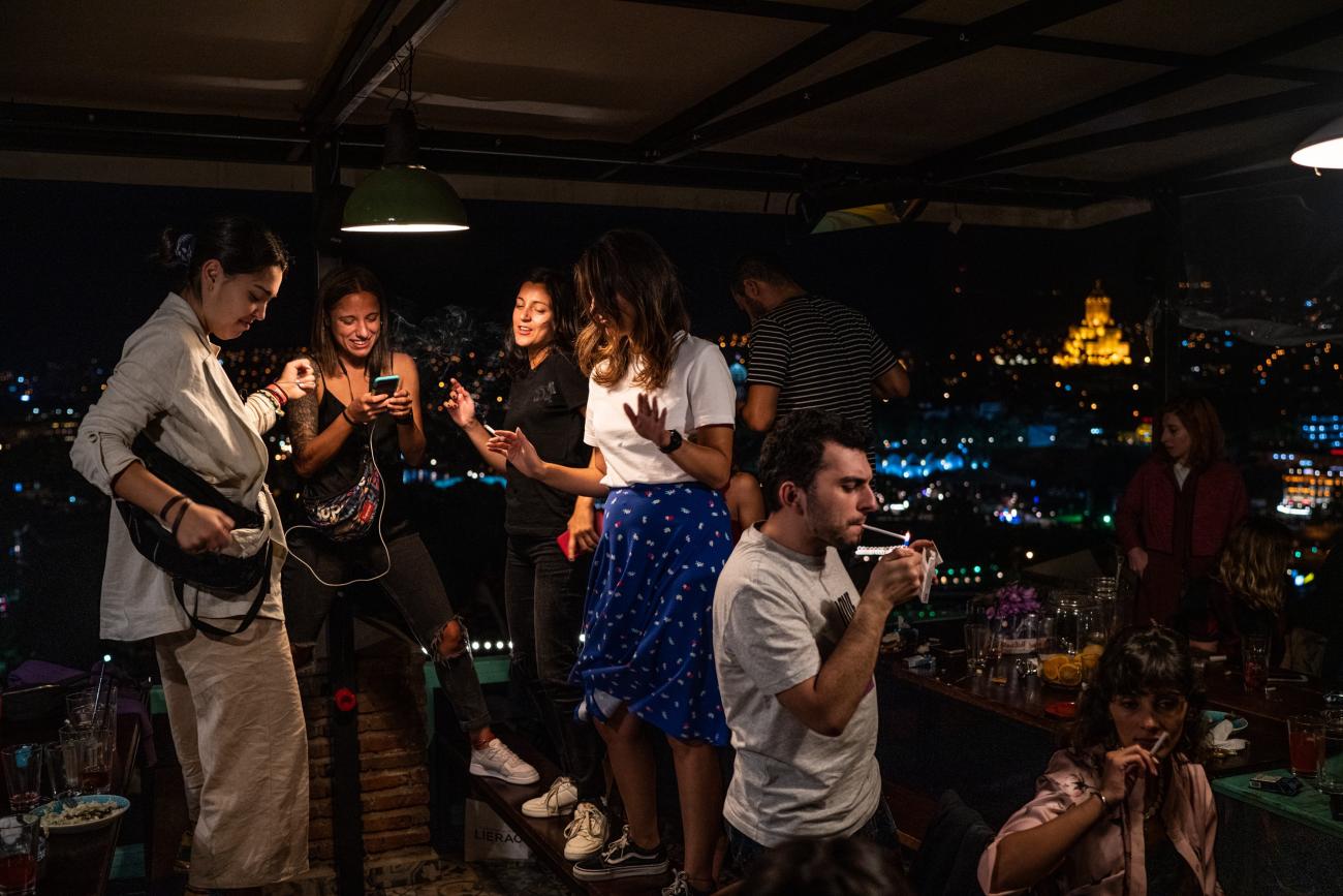 In Tiblisi, Georgia, friends dance following a dinner party
