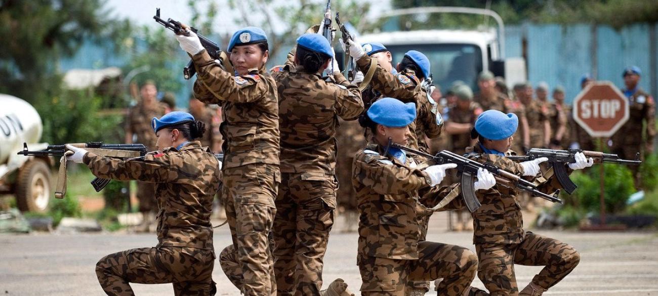 Mongolian peacekeepers serving in a guard unit assigned to protect the Special Court for Sierra Leone perform a tactical exercise.