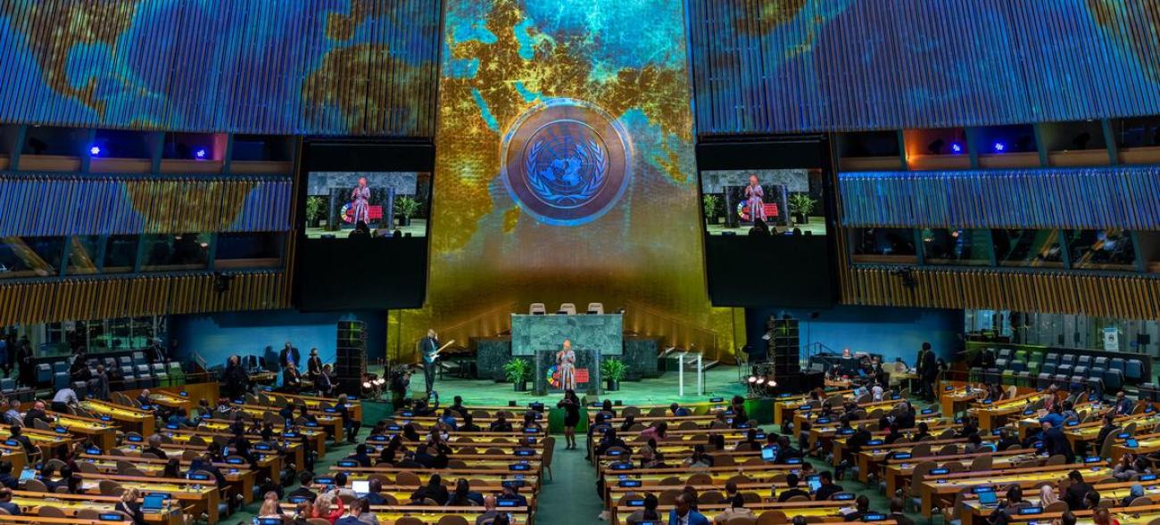 A beautifully lit general assembly hall at the United Nations headquarters