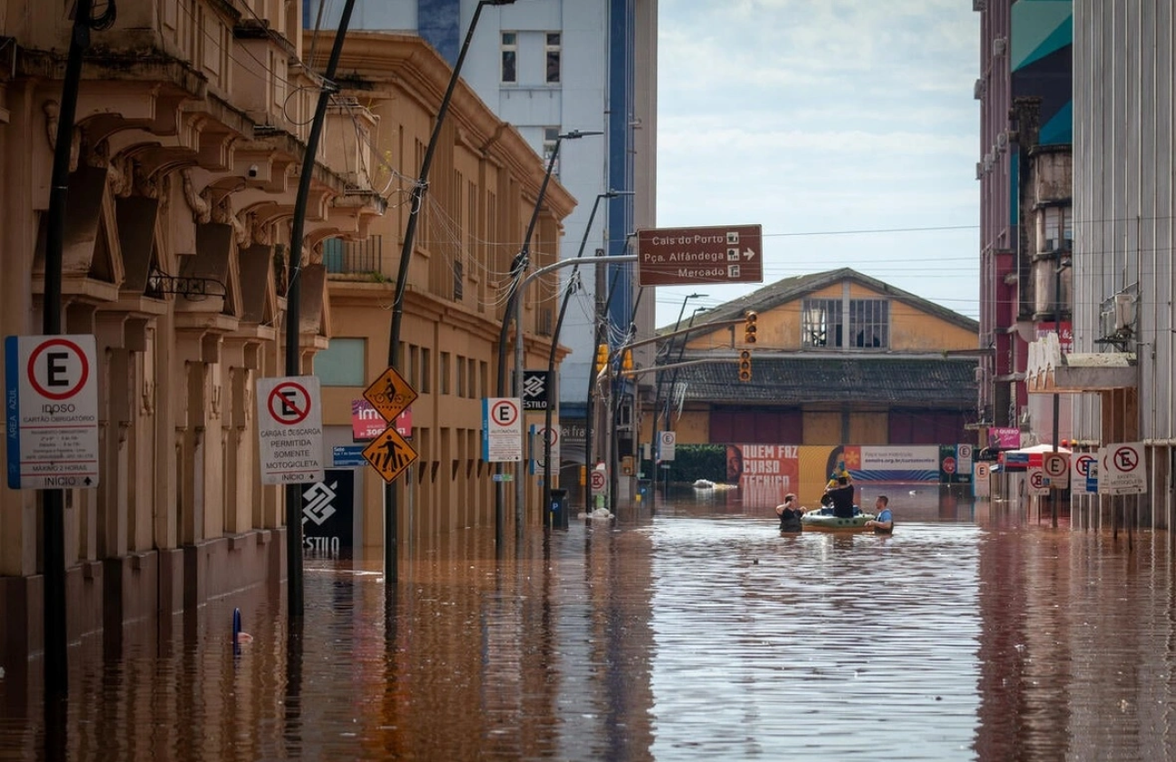 A flooded street, with brown water