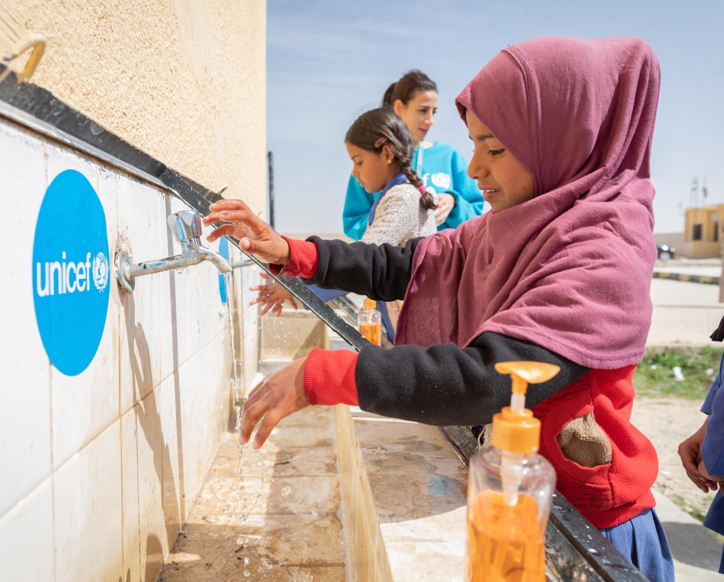 Children in Al Khader mixed primary school take part in a handwashing demonstration.