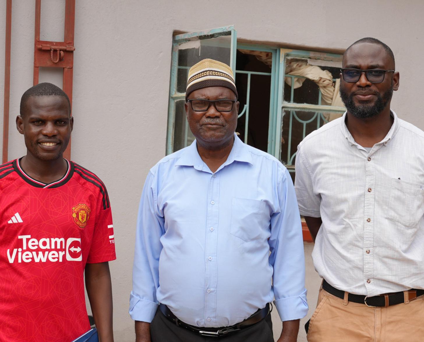 Трое мужчин разного возраста